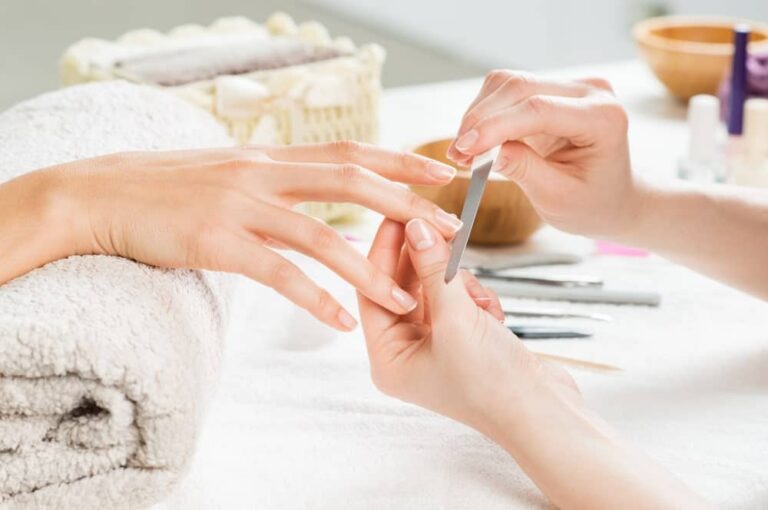 A woman getting a manicure 1